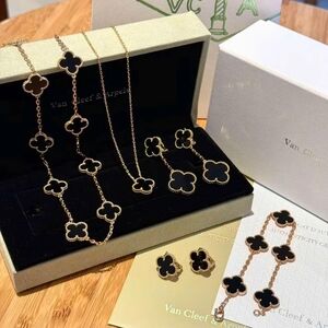 Van Cleef & Arpels Black and Gold Alhambra Necklace, Bracelet & Earrings Set